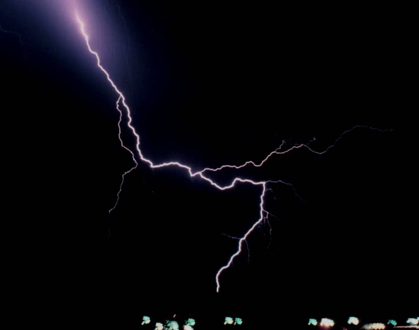Branching cloud-to-ground lightning at night near Boulder, Colorado