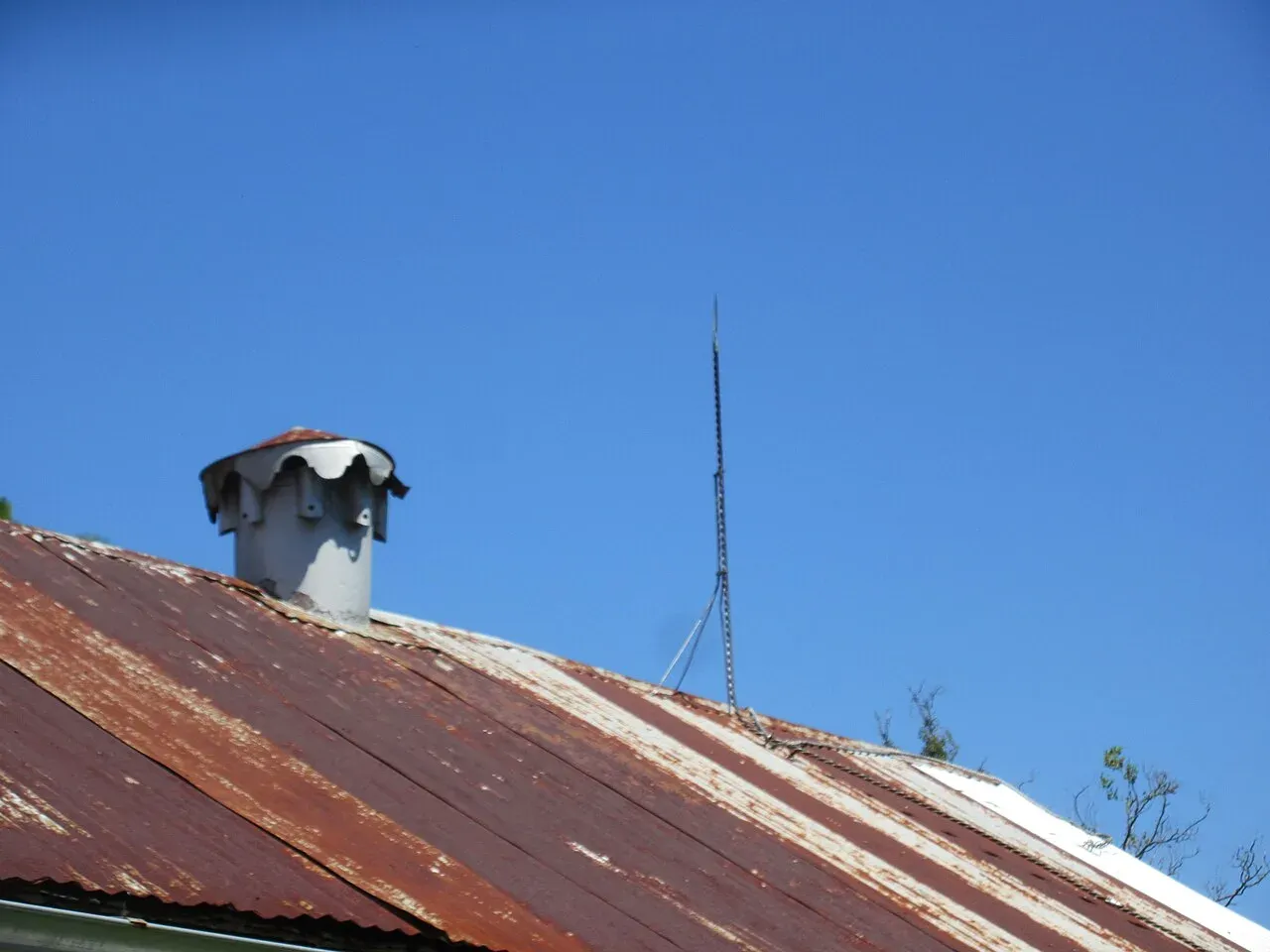 Lightning rod air terminal mounted on the metal roof of Woodland Plantation House in LaPlace, Louisiana, one of the lightning protection system components