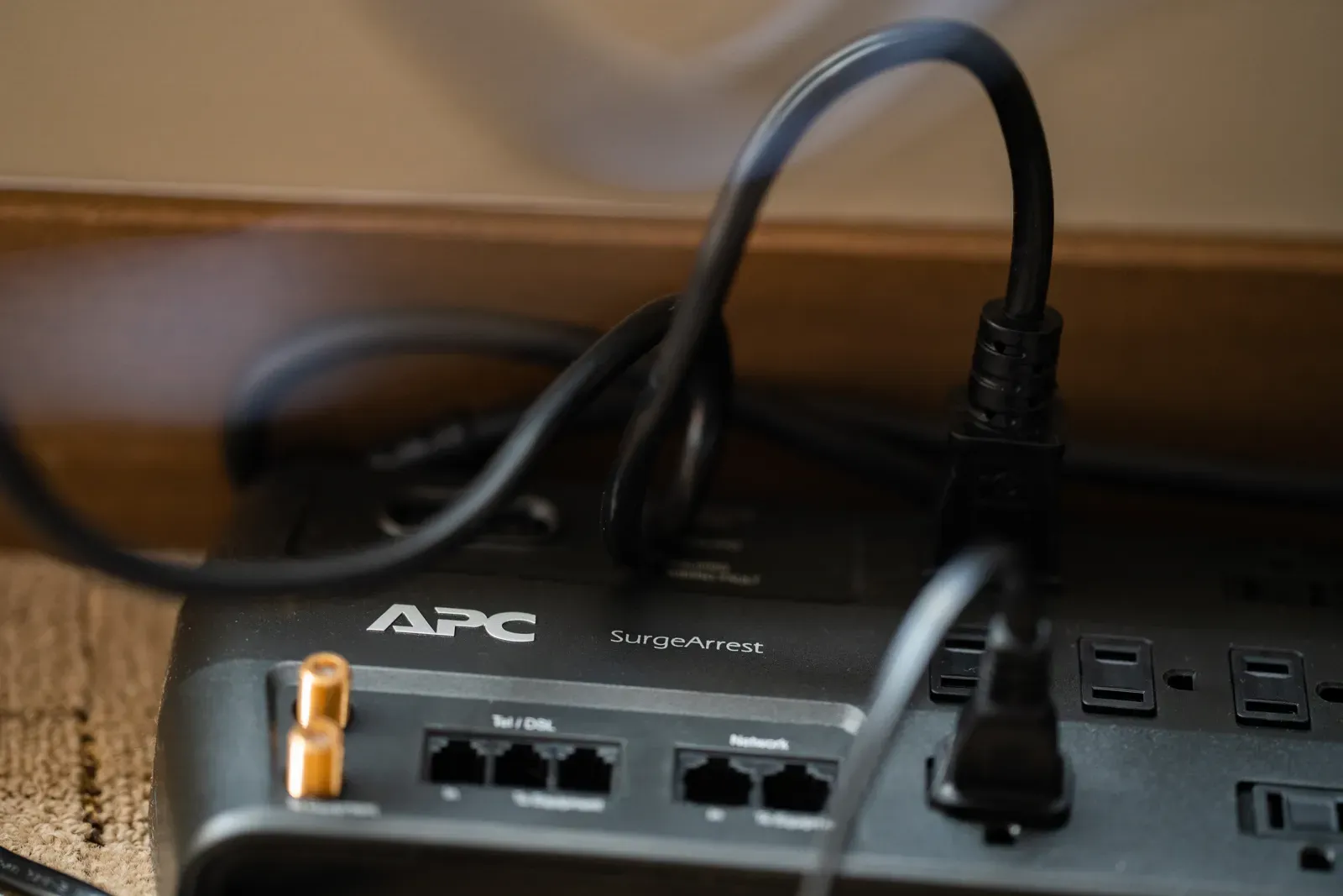 Surge protector power strip with cords plugged in